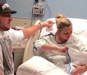 Mom Cradles Her Tiny Newborn then she Sees Under The Baby’s Blanket and realizes