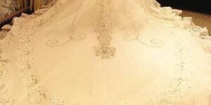 Wedding dress down the aisle that she stored in a garbage bag from 1961