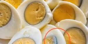Why does a green ring appear around hard-boiled eggs?