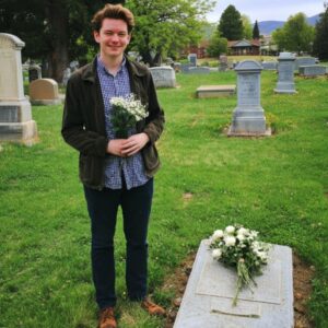 While Adults Overlook Grandpa’s Overgrown Grave, Young Boy Cleans It and Discovers Hidden Coordinates Carved Into Stone