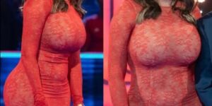 Carol Vorderman flaunts her toned abs and buxom bottom