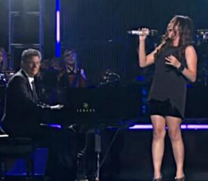 Even the pianist could not stand it when she began to sing. He had never heard such a sound in his life..
