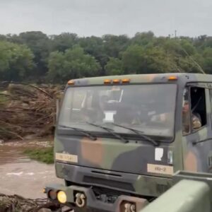 JUST IN: Texas National Guard Truck Arrives Full of Rescued Girls from Flood-Wrecked Campground