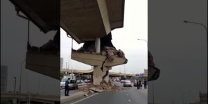 The bridge support collapsed after the earthquake, but it was just the outer concrete #crash #car